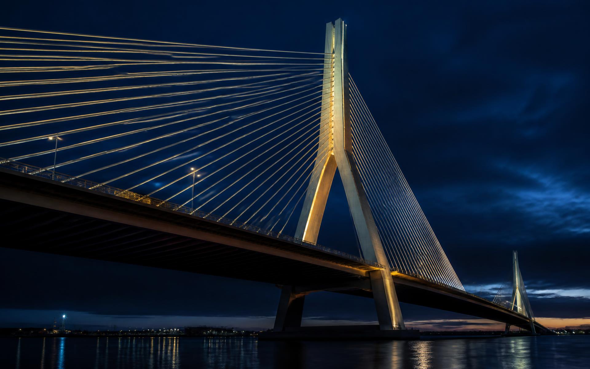 Illuminated cable-stayed bridge at dusk